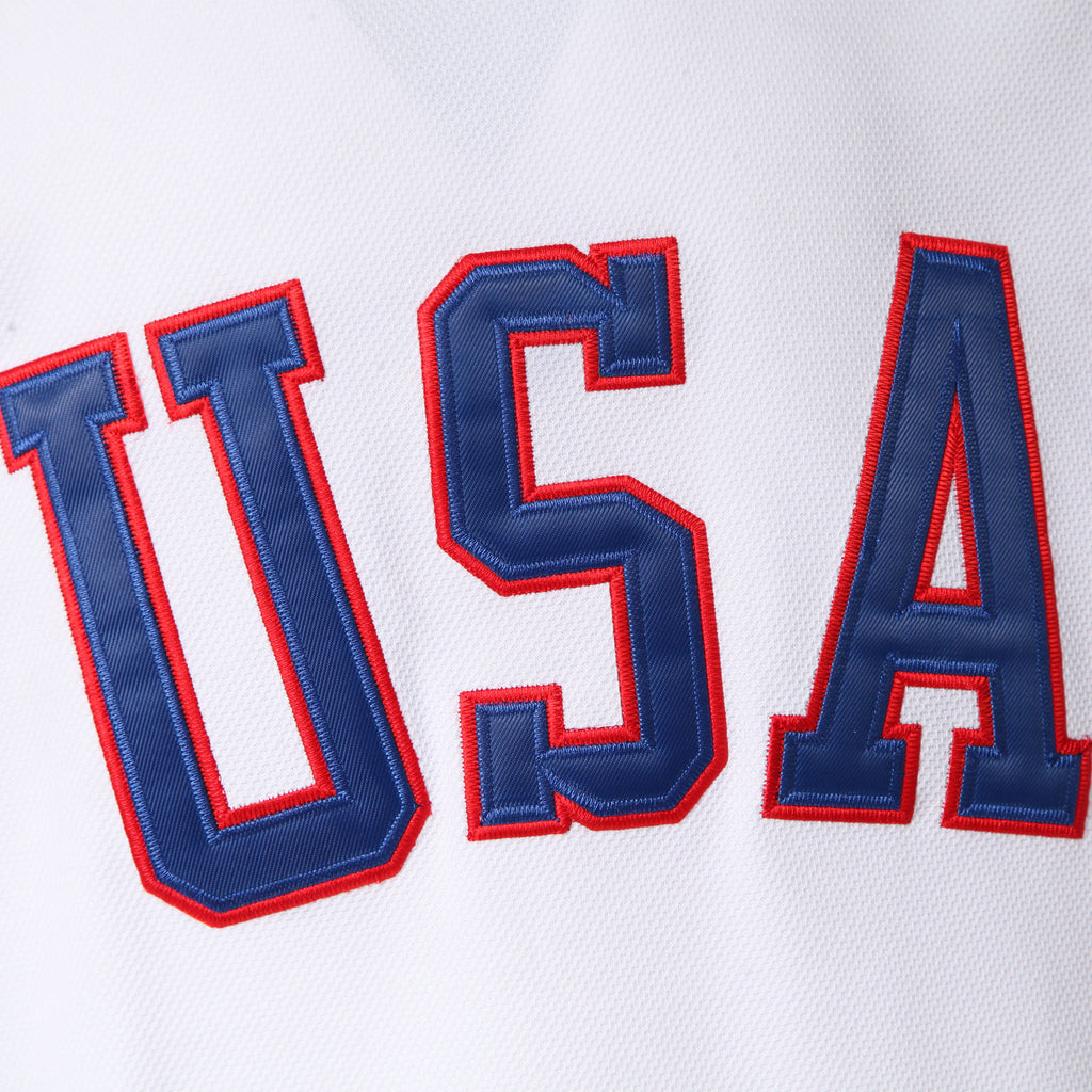 Close-up of the double-layer tackle twill embroidered USA logo on the front of a 1980 Team USA Miracle on Ice hockey jersey