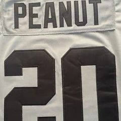 Rear view showing "peanuts" name and number 20 in detailed stitching on the Peanuts Wildcats football jersey