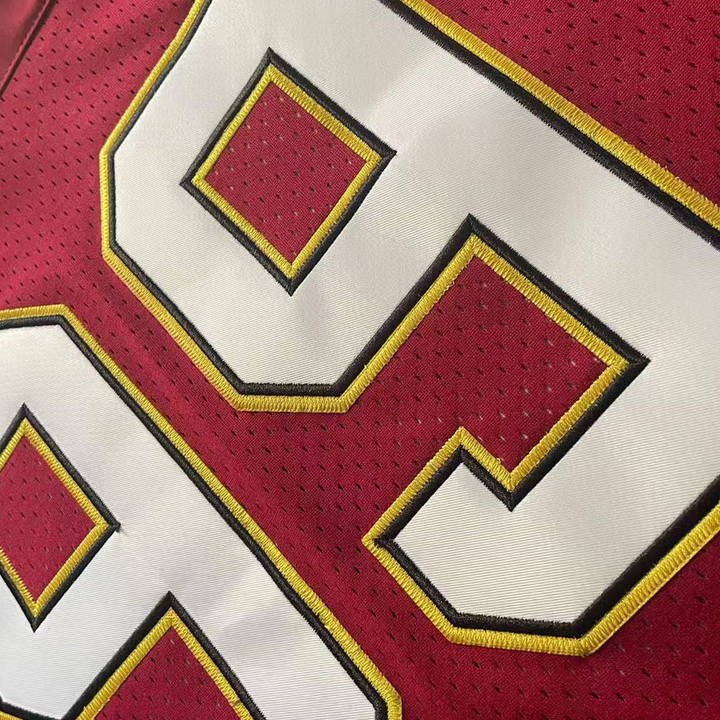 High-quality tackle twill embroidery of number 99 on the chest of The Program jersey.