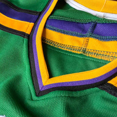 the v neck detail of custom mighty ducks jersey, black, purple and yellow stripes neck