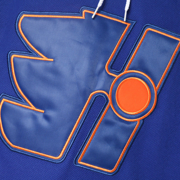 Close-up of the premium embroidered Halifax Highlanders team crest on the chest