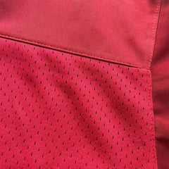 Close-up of 200 GSM heavyweight breathable mesh fabric used for movie replica jerseys.