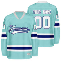 custom ice blue and navy hockey jersey thumbnail