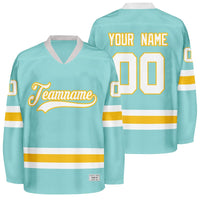 custom ice blue and yellow hockey jersey thumbnail